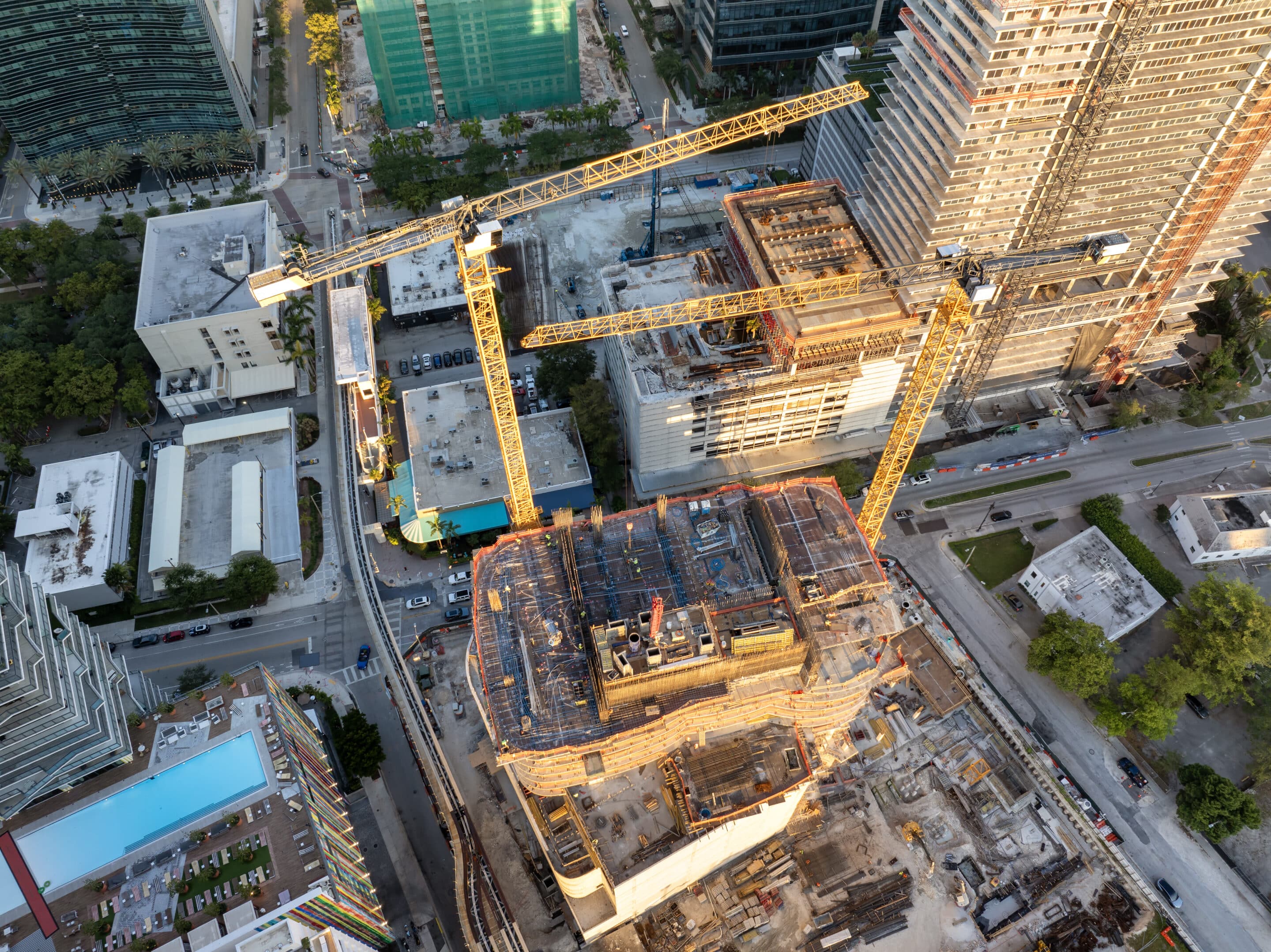Skyscraper construction in Miami, Florida at sunset.